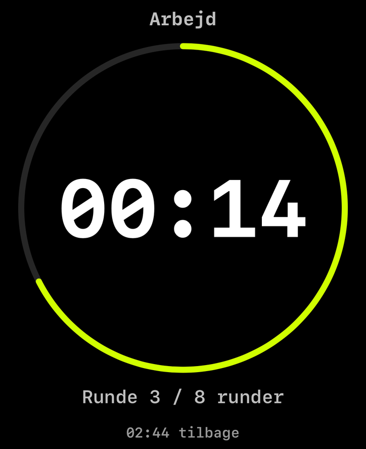 Arbejd, 14 sekunder tilbage, inde i en lime ring. Runde 3 af 8, 2:44 tilbage af træningen.